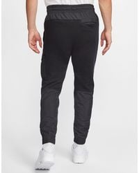 nike lightweight utility cargo joggers in light grey