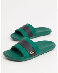 Sandalias verdes estilo cocodrilo dorado Lacoste de Caucho de color Verde  para hombre | Lyst