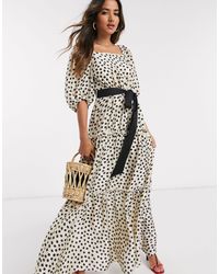 Vestito lungo a balze con maniche voluminose a pois di Mango in Bianco |  Lyst