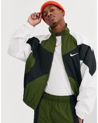 green nike track jacket