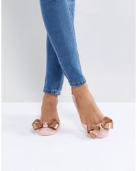 rose gold flat pumps