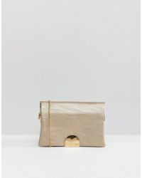 oasis gold bag