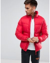 black puffer jacket with red inside