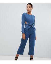 missguided cut out denim jumpsuit in blue