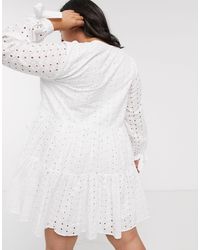 tiered trapeze mini dress in broderie