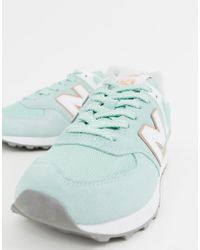 mint green new balance trainers