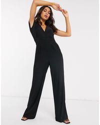 Tuta jumpsuit sinuosa nera di Mango in Nero | Lyst