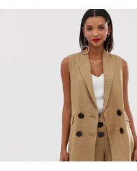 mango sleeveless coat