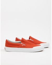 vans slip on orange