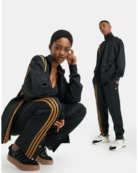 Adidas x - Pantaloni sportivi neri con bottoni a pressioneIvy Park in  Cotone di colore Nero | Lyst