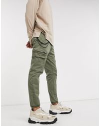 Pantaloni cargo con elastico sul fondo e catena kaki da Uomo di Pull\u0026Bear  in Verde | Lyst