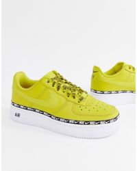 Air Force 1 - Sneakers gialle con fettuccia e logo di Nike in ... Air Force 1 - Sneakers gialle con fettuccia e logo di Nike in ...