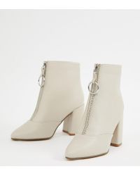 white zipper boots