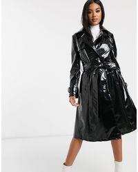 Femme Vêtements Manteaux Manteaux de fourrure Manteau trapèze avec bordures en fausse fourrure verni Helene Berman en coloris Noir 