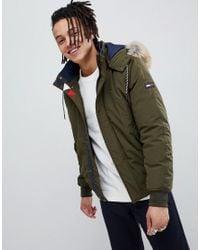 Tommy Hilfiger Down and padded jackets for Men - Up to 40% off at Lyst.com