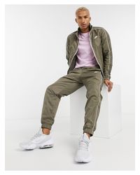 Chándal tejido en caqui Nike de Tejido sintético de color Verde para hombre  | Lyst