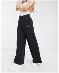 Joggers neri a vita alta con fondo ampioNike in Cotone di colore Nero | Lyst