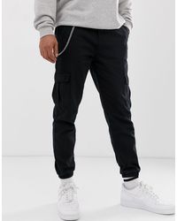 Pantaloni cargo neri con catenaBershka in Denim da Uomo colore Nero - Lyst