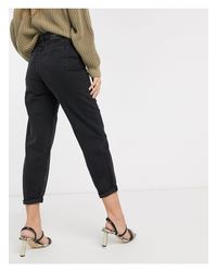 Vaqueros revestidos en negro de efecto push up de Stradivarius - GLAMI.es