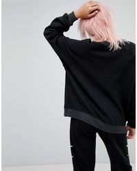 Felpa con stampa di uccelli e rose di Wildfox in Black