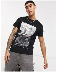 Camiseta negra con estampado Tommy Hilfiger de hombre de color Negro | Lyst