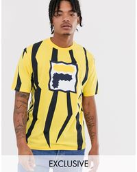 black and gold fila shirt