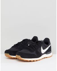 nike black internationalist trainers