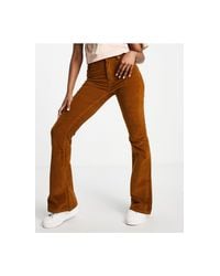 Pantaloni a zampa a vita altaPull\u0026Bear in Velluto a coste di colore Marrone  | Lyst