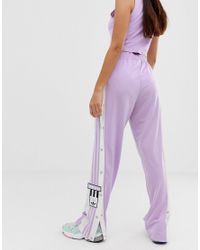 adibreak track pants purple