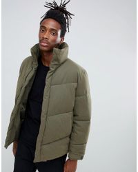 green oversized puffer jacket