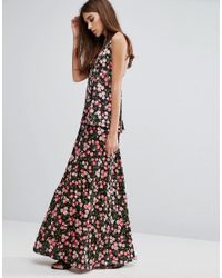 Robe Longue A Imprime Fleurs De Cerisier Avec Bretelles Croisees Dans Le Dos Satin Warehouse En Coloris Noir Lyst
