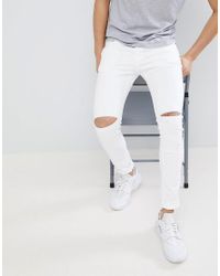 mens skinny jeans with knee rips