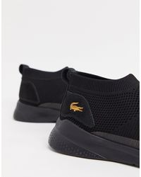 Zapatillas estilo calcetín negras lt fit Lacoste de hombre de color Negro |  Lyst