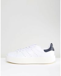 black stan smith white sole