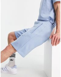 Adicolor - pantaloncini celeste marshmallow da Uomo di adidas Originals in  Blu | Lyst