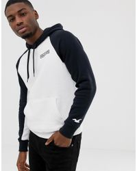 Sudadera con capucha con logo y colour block trasero en blanco y negro  Hollister de Algodón de color Blanco para hombre | Lyst