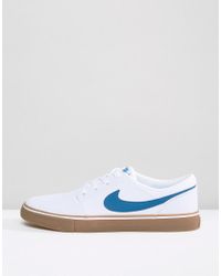 nike sb portmore ii ss trainers with gum sole in black
