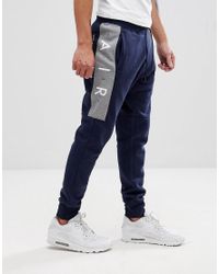 nike air tracksuit blue