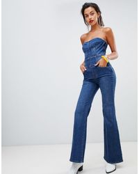 Tuta jumpsuit di jeans cropped a zampa senza spallineMiss Sixty in Denim di  colore Blu | Lyst