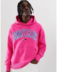 Sudadera holgada rosa con capucha de estilo universitario Tommy Hilfiger de  Denim de color Rosa para hombre | Lyst