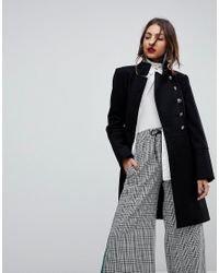 mango button front mid length coat