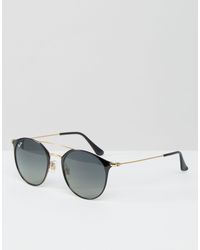 Occhiali da sole rotondi con barretta doppia di Ray-Ban in Nero | Lyst