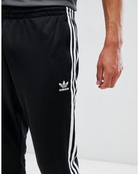 adidas originals adicolor superstar joggers in black