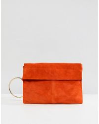 orange suede clutch bag