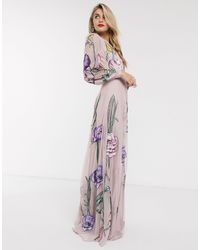 Vestito lungo con cut-out sul retro e fiori oversize ricamatiASOS in  Materiale sintetico di colore Rosa | Lyst