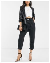 Jeans larghi neri con vita elasticizzataStradivarius in Denim di colore  Nero | Lyst