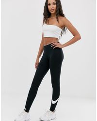Nike Cotton Club leggings With Swoosh Logo, Plain Pattern in Black - Lyst