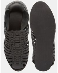 black leather woven sandals