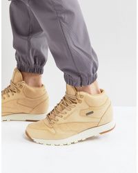 reebok mid trainers