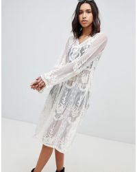 white crochet festival dress